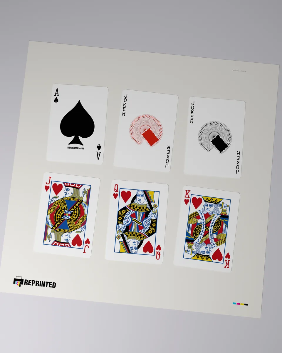 The ace of spades, the two jokers and the jack, queen and king of hearts from REPRINTED #02 laid out on a sheet
